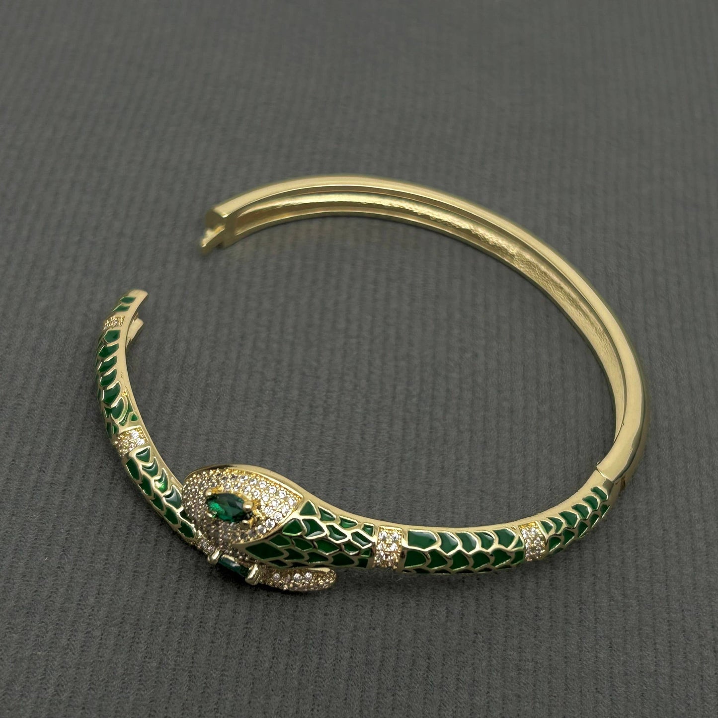 Green and gold snake bracelet showing 8mm width and intricate design detai