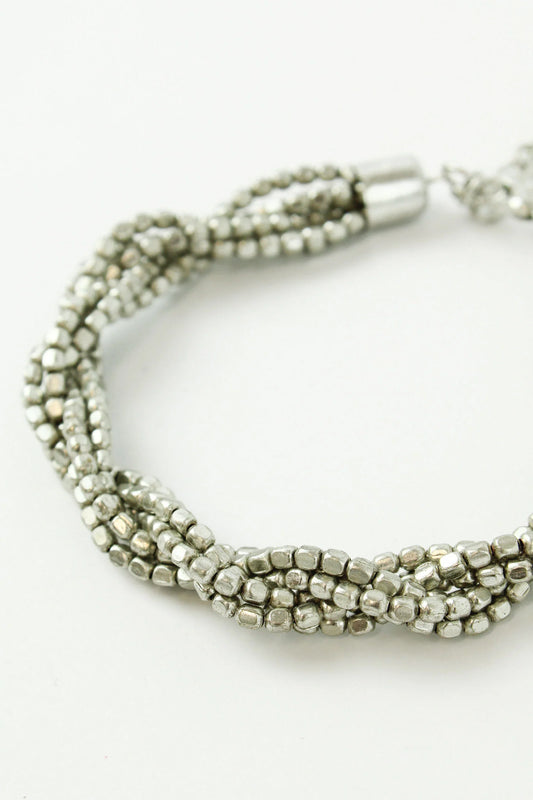 Bracelet torsadé en perles d'argent