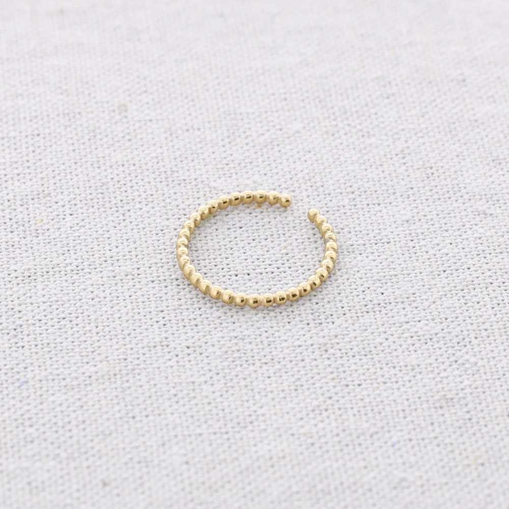 Bague à pompon à texture fine