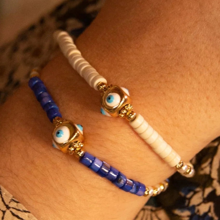 Pulsera de ojos color crema