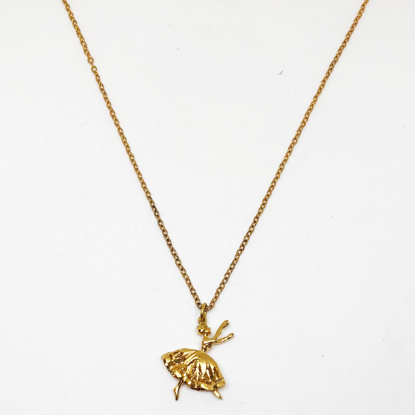 Necklace with dancing girl charm