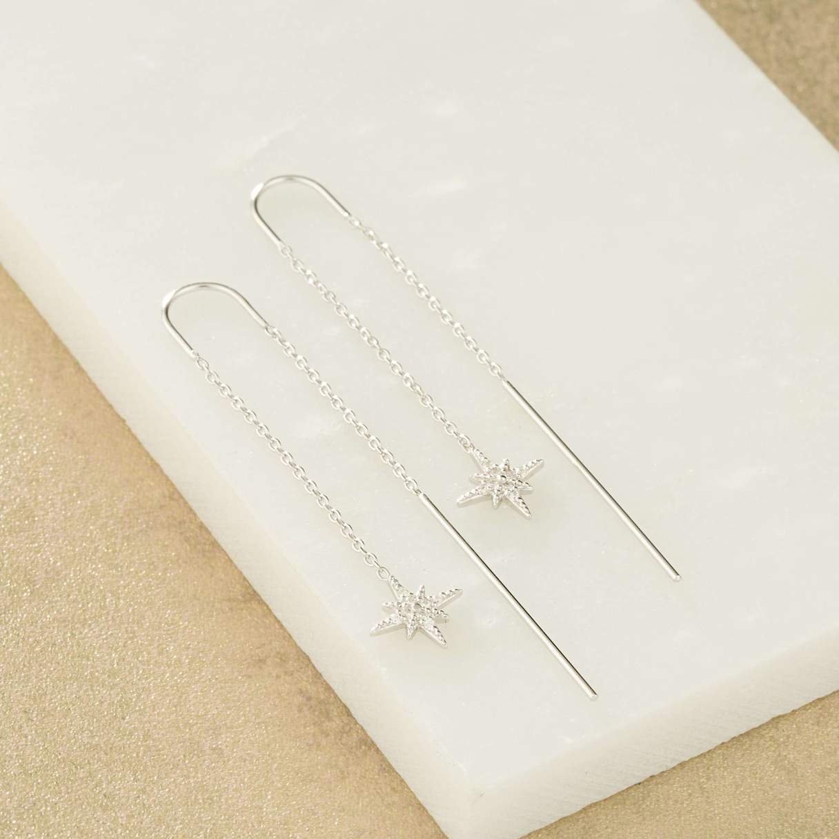 Boucles d'oreilles en argent avec étoile filante