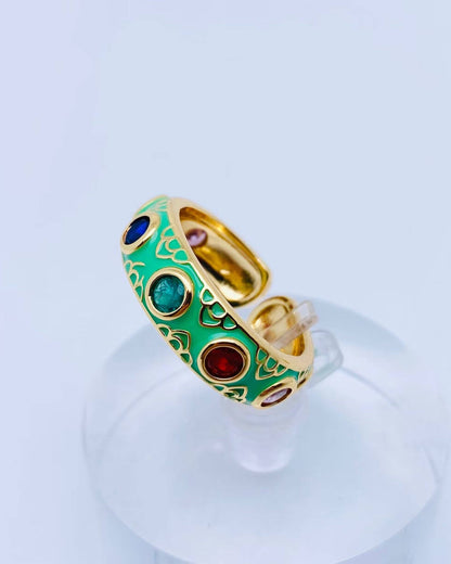 Green enamel adjustable ring with seven colors of cubic zirconia stones