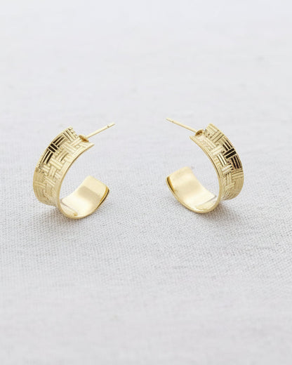 Gold woven texture hoop earrings with intricate basketweave pattern