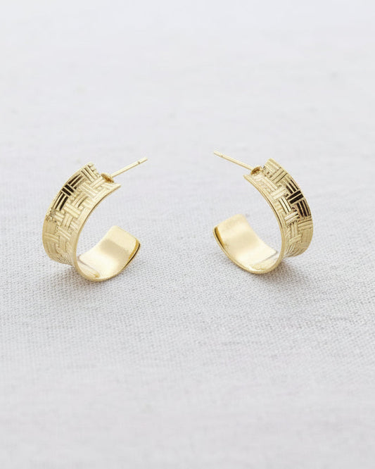 Gold woven texture hoop earrings with intricate basketweave pattern