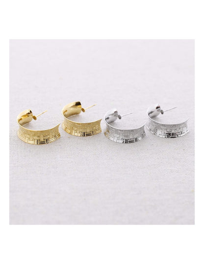 Two pairs of hoop earrings, one gold and one silver, on a white background.