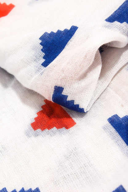 Bufanda/pareo triangular escalonado en tonos azul y óxido