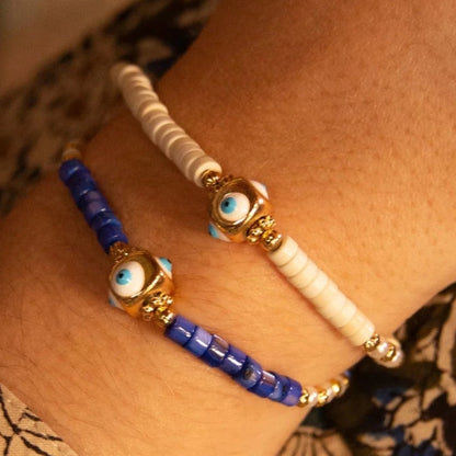 Pulsera de ojos color crema
