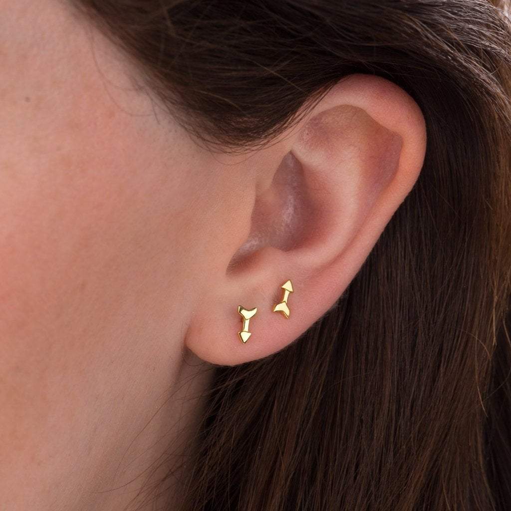 Tiny gold arrow studs