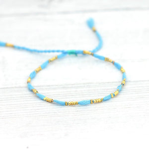 Thread and Gold Bead bracelets