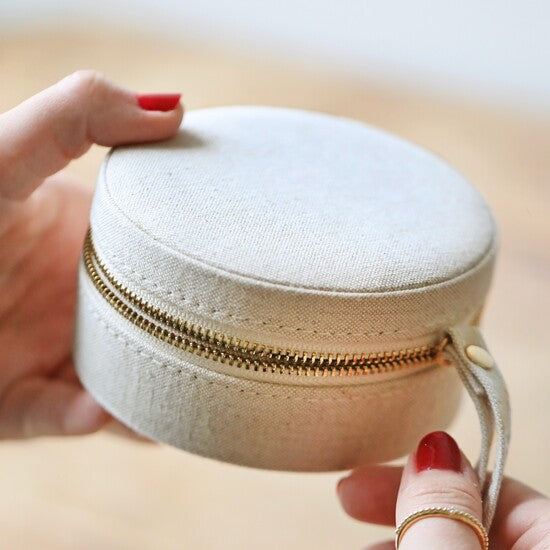 Round natural linen travel jewellery case