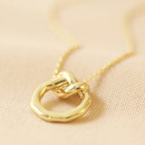 Gold Infinity knot necklace